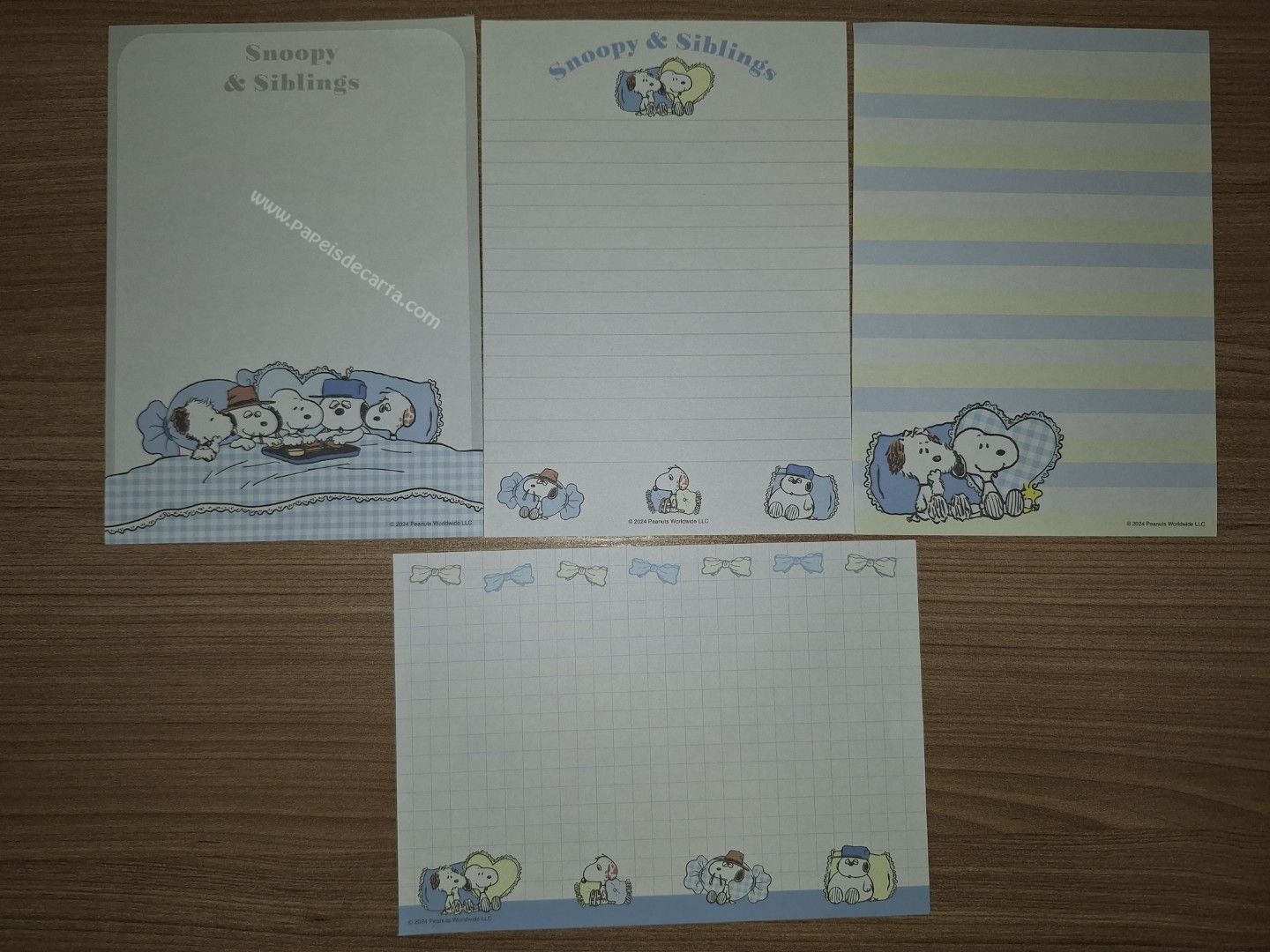 Lote com 4 papéis do Snoopy 32